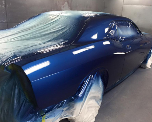 Refinishing auto body panel
